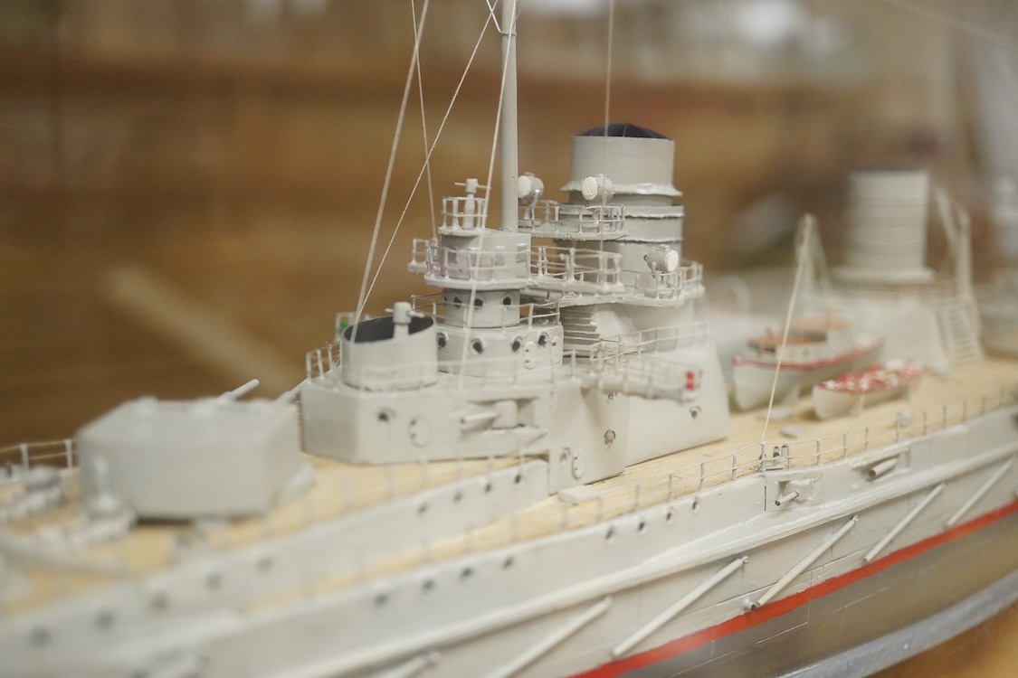 A cased Colin Freeman model of the German battle cruiser, S.M.S. Seydliyz, a well detailed model, with plaque describing the technical details and history regarding her involvement at the battle of Jutland, case 75 x 19.